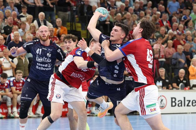 September 5, 2026, xBHAx, Handball, Opel HBL, 2026–2027 Season, 1st HBL, SG Flensburg-Handewitt vs. Handball Club Hamburg, GGW Arena: Dominik Axmann (Handball Club Hamburg 15) defends against Aymeric Minne (SG Flensburg-Handewitt 44), Jan Christian Schmidt (Handball Club Hamburg 42) on defense; Schleswig-Holstein, Germany