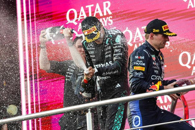 F1 - AZERBAIJAIN GRAND PRIX 2026 RUSSELL George (gbr), Mercedes AMG F1 Team W17, portrait VERSTAPPEN Max (nld), Red Bull Racing Ford RB22, portrait podium Moet during the 2026 Formula 1 Azerbaijan Grand Prix, 15th round of the 2026 Formula One World Championship, WM, Weltmeisterschaft from September 24 to 26, 2026 on the Baku City Circuit, in Baku, Azerbaijan - BakuAzerbaijan Copyright: xXavixBonillax