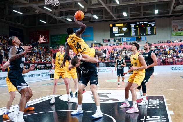 Jesse Chidera Ani, Tigers Tübingen, 14, and Nick Muszynski, MLP Academics Heidelberg, 33, GER, Tigers Tübingen vs. MLP Academics Heidelberg, Basketball, ProA, Matchday 1, 2026–2027 season, September 26, 2026, GER, Tigers Tübingen vs. MLP Academics Heidelberg, Basketball, ProA, Matchday 1, 2026–2027 season, September 26, 2026, Tigers Tübingen Copyright: xEibner-Pressefoto KirstenxJaegerx