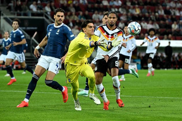 September 27, 2026, xemx, Soccer UEFA Nations League, Germany vs. Greece, Konstantinos Tzolakis (Greece), Konstantinos Mavropanos (Greece), Kevin Schade (German National Soccer Team, DFB), tackle, action, battle for the ball, Augsburg