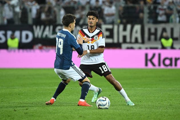 September 27, 2026, xemx, Soccer, UEFA Nations League, Germany vs. Greece, Konstantinos Karetsas (Greece) and Nathaniel Brown (German National Soccer Team, DFB), tackle, action, battle for the ball, Augsburg