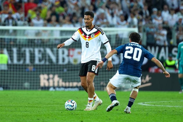 September 27, 2026, GER, Soccer, Men s, UEFA Nations League, League A, 2026–2027 Season, Matchday 2, Germany vs. Greece: Felix Nmecha (Germany, No. 8) on the left; Christos Zafeiris (Greece, No. 20) on the right. DFB and DFL regulations prohibit any use of photographs as image sequences and or quasi-video. Augsburg WWK Arena, Bavaria, Germany Copyright: xNordphoto Schneiderx