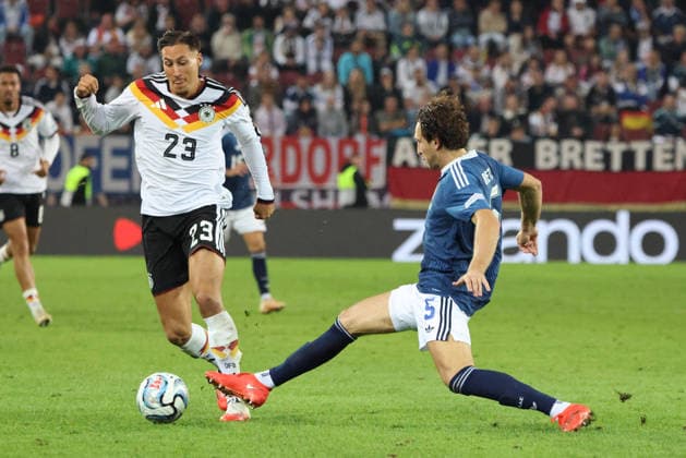 September 27, 2026, Soccer, Men s, 2027 UEFA Nations League, Germany vs. Greece, Younes Ebnoutalib (Germany), Panagiotis Retsos (Greece), Augsburg WWK Arena, Bavaria, Germany, DEU Copyright: xSebastianxBachx