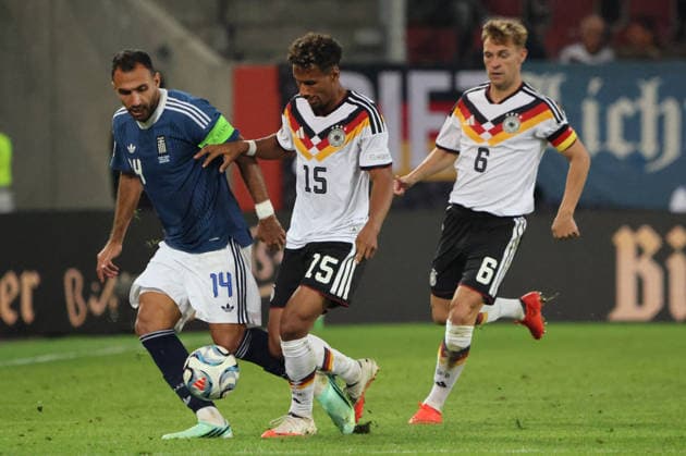 September 27, 2026, Soccer, Men s, 2027 UEFA Nations League, Germany vs. Greece, Vangelis Pavlidis (Greece), Bambase Conte (Germany), Augsburg WWK Arena, Bavaria, Germany, DEU Copyright: xSebastianxBachx