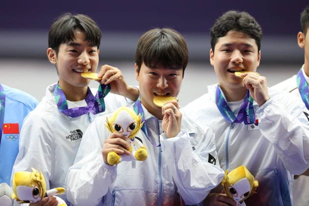 S. Korea wins gold in men s team rapid fire pistol shooting S. Korea wins gold in men s team rapid fire pistol shooting (From L to R) Lee Gun-hyeok, Yoon Seo-yeong and Song Jong-ho of South Korea bite their gold medals during the medal ceremony after winning the men s team 25-meter rapid fire pistol shooting event at the 2026 Aichi-Nagoya Asian Games at Aichi Prefectural General Shooting Gallery in Toyota, Aichi Prefecture, central Japan, on Oct. 1, 2026. (Yonhap) 2026-10-01 18:49:00 <Copyright ¨Ï 1980-2026 YONHAPNEWS AGENCY. .> ÀϺ» EDITORIAL USE ONLY Copyright: xx Korea ???x 0868305677st