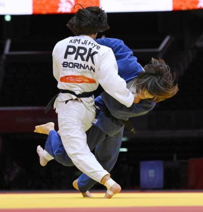 Aichi-Nagoya Asian Games: Judo Japan s Narumi Tanioka (blue) competes against Kim Ji Hye of North Korea in the Aichi-Nagoya Asian Games women s judo 63-kilogram final at Aichi International Arena in Nagoya, central Japan, on Oct. 1, 2026. A14AA0005629638P