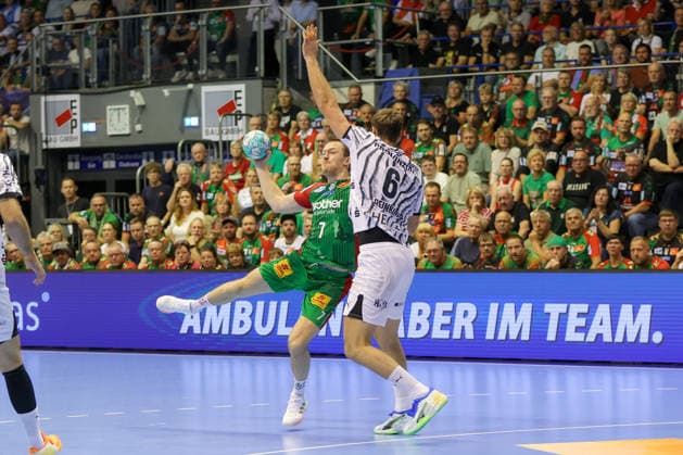 September 30, 2026, xgox, Handball, Opel HBL, SC Magdeburg vs. THW Kiel, emspor, from left: Felix Claar (Magdeburg), 7, Harald Reinkind (Kiel), 6; duel, battle, tackle, Magdeburg