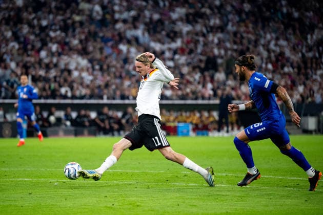 October 1, 2026, GER, Soccer, Men s, UEFA Nations League International Match, League A, Matchday 3, Germany vs. Serbia: Nick Woltemade (Germany), No. 11 with the ball, next to him Nemanja Gudelj (Serbia), No. 6, Munich, Allianz Arena, Bavaria, Germany Copyright: xNordphoto Memmlerx