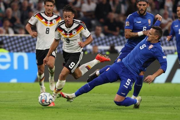 One-on-one, action, featuring Derry Scherhant 9 (Germany) and Nemanja Maksimovic 5 (Serbia), Germany vs. Serbia, soccer, UEFA Nations League, Matchday 3, October 1, 2026, Munich, Bavaria, Germany Copyright: xkolbert-press ChristianxKolbertx