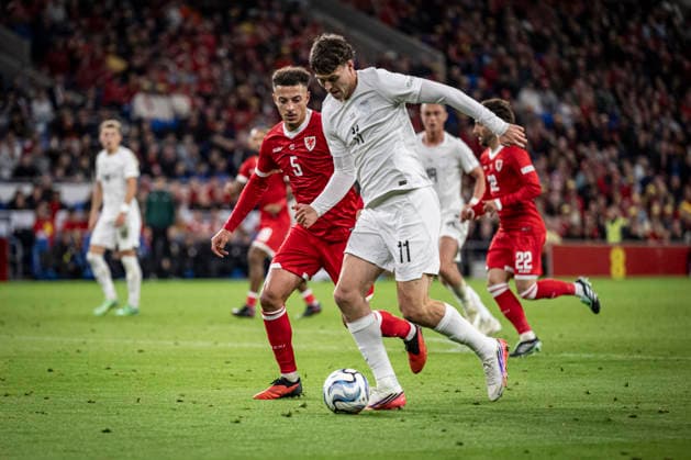 RECORD DATE NOT STATED 1st October 2026; Cardiff City Stadium, Cardiff, Wales; UEFA Nations League Football, Wales versus Norway; Jorgen Strand Larsen of Norway holds off Ethan Ampadu of Wales GodfreyxPitt