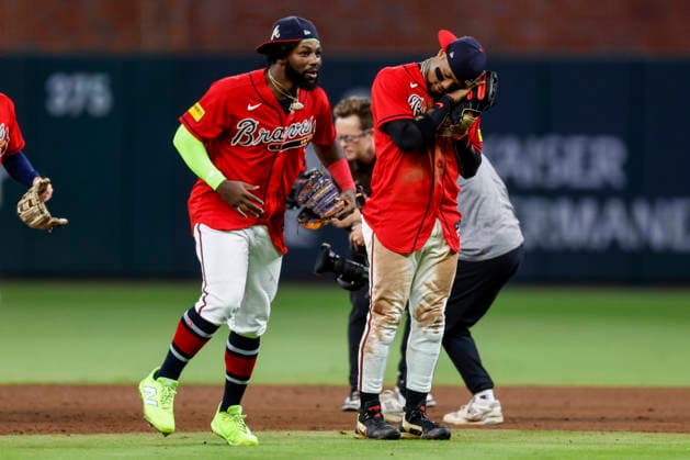 Atlanta Braves center fielder Michael Harris II (23) and Atlanta Braves right fielder Ronald Acuna Jr. (13) celebrate after defeating the Philadelphia Phillies in game three of the MLB, Baseball Herren, USA National League Wild Card round at Truist Park in Atlanta, Georgia on Thursday, October 1, 2026. ATL20261001341 MIKExZARRILLI