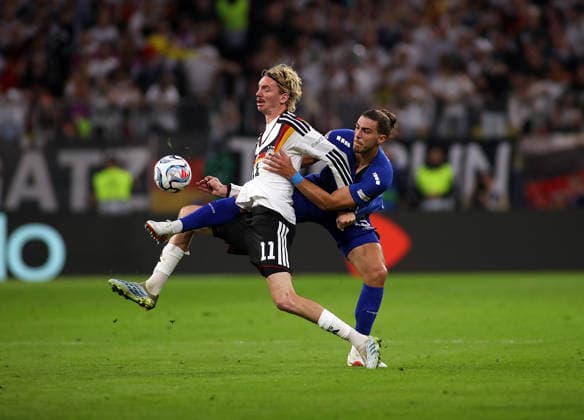 Germany vs. Serbia, Soccer, Men s, 2026–2027 Season, International Match, Nations League, Matchday 3, League A, Group 2, Allianz Arena: Nick Woltemade (Germany, left) and Srdan Babic (Serbia, right) battle for the ball, match scene