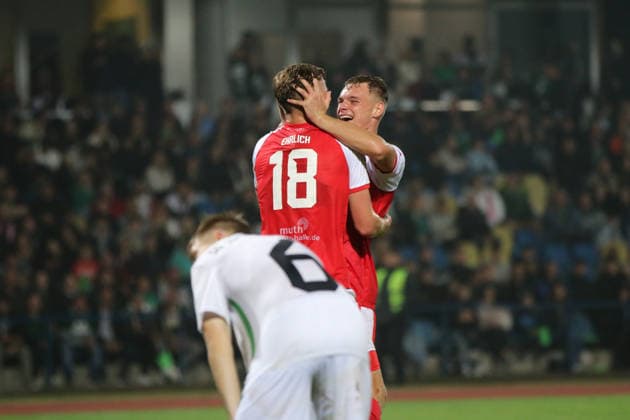 October 2, 2026 Men s Soccer 2026–2027 dachbleche24 State Cup, 2nd Round: SG Reppichau vs. Hallescher FC at Paul Greifzu Stadium in Dessau-Roßlau; Lucas Ehrlich (Halle, 18, red) and Vin Kastul (Halle, 27, red, celebrate Ehrlich’s goal and the victory in the cup match in Dessau-Roßlau, Saxony-Anhalt, Germany