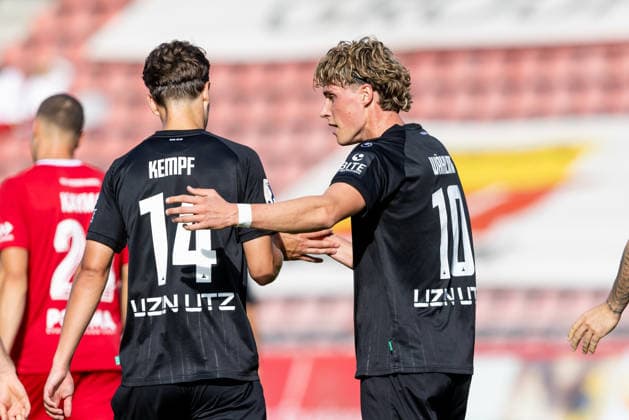 KSV Hessen Kassel vs. SSV Ulm 1846 Soccer, Regionalliga Südwest, Matchday 10, Auestadion Kassel, October 3, 2026—Goal celebration, cheers, and joy after Oliver Wähling’s goal for SSV Ulm 1846, making the score 1–1. SSV Ulm 1846 soccer, 10 (from left) Karl Kempf, SSV Ulm 1846 soccer, 14, Oliver Wähling SSV Ulm 1846 Soccer, 10 KSV Hessen Kassel vs. SSV Ulm 1846 Soccer, Regionalliga Southwest, Matchday 10, Auestadion Kassel, October 3, 2026; Photo by Lucca Fundel; Kassel Auestadion, Hesse, Germany