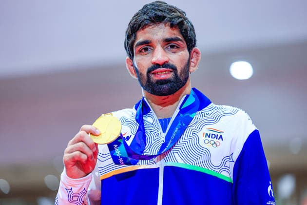 Asian Games Podium: 57kg Freestyle Gold – Aman Aman (IND) Copyright: xAmirrezaxAliasgarix