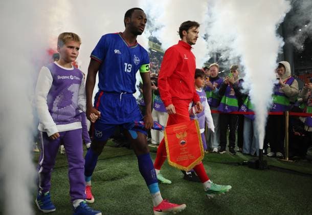 Russia Soccer Friendly Russia - Namibia 9256948 03.10.2026 Namibia s Peter Shalulile and Russia s Aleksei Miranchuk walk to the pitch before the friendly soccer match between Russia and Namibia at Yekaterinburg Arena in Yekaterinburg, Russia. Alexei Kolchin Sputnik Yekaterinburg Sverdlovsk Oblast Region Russia Copyright: xAlexeixKolchinx