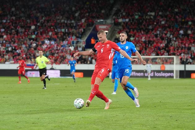 Luzern, Switzerland - October 03: Danijel Sturm (15 SLO) against Nico Elvedi (4 SUI) during the UEFA Nations League match between Switzerland and Slovenia at thermoplan arena on October 03, 2026 in Luzern, Switzerland. Copyright: xKjetilxWaberx xSPPx Sportspressphoto_SPR244754