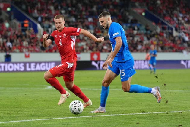 Luzern, Switzerland - October 03: Danijel Sturm (15 SLO) in duel for the ball with Nico Elvedi (4 SUI) during the UEFA Nations League match between Switzerland and Slovenia at thermoplan arena on October 03, 2026 in Luzern, Switzerland. Copyright: xKjetilxWaberx xSPPx Sportspressphoto_SPR244768