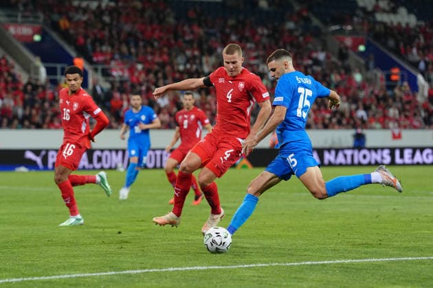 Luzern, Switzerland - October 03: Danijel Sturm (15 SLO) in duel for the ball with Nico Elvedi (4 SUI) during the UEFA Nations League match between Switzerland and Slovenia at thermoplan arena on October 03, 2026 in Luzern, Switzerland. Copyright: xKjetilxWaberx xSPPx Sportspressphoto_SPR244770