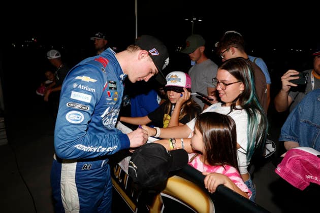 LAS VEGAS, CA - OCTOBER 03: Corey Day ( 17 Hendrick Motorsports HendrickCars.com Chevrolet) signs autographs in victory lane after winning the Focused Health 302 NASCAR, Motorsport, USA O™Reilly Auto Parts Series race on October 3, 2026, at Las Vegas Motor Speedway in Las Vegas, NV. (Photo by Jeff Speer LVMS Icon Sportswire) AUTO: OCT 03 NASCAR O™Reilly Auto Parts Series Focused Health 302 EDITORIAL USE ONLY Icon26100318944