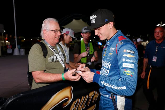 LAS VEGAS, CA - OCTOBER 03: Corey Day ( 17 Hendrick Motorsports HendrickCars.com Chevrolet) signs autographs in victory lane after winning the Focused Health 302 NASCAR, Motorsport, USA O™Reilly Auto Parts Series race on October 3, 2026, at Las Vegas Motor Speedway in Las Vegas, NV. (Photo by Jeff Speer LVMS Icon Sportswire) AUTO: OCT 03 NASCAR O™Reilly Auto Parts Series Focused Health 302 EDITORIAL USE ONLY Icon26100319052