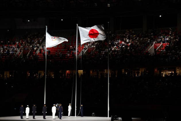 (261004) -- NAGOYA, Oct. 4, 2026 -- The national flag of Japan and flag of Olympic Council of Asia (OCA) are seen during the closing ceremony of the 20th Asian Games Aichi-Nagoya 2026 in Nagoya, Japan, Oct. 4, 2026. ) (SP)JAPAN-NAGOYA-ASIAN GAMES-CLOSING CEREMONY WuxZhizun