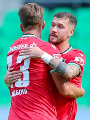 Marcel Hartel of Hannover 96 celebrates his 1-0 goal with Franz Roggow of Hannover 96 during the friendly match between Hannover 96 and SC Verl at the Heinz von Heiden Arena on October 3, 2026, in Hannover, Germany. Photo by Marco Steinbrenner, DeFodi Images. Marcel Hartel of Hannover 96 celebrates after scoring his team’s first goal with Franz Roggow of Hannover 96 during the friendly match between Hannover 96 and SC Verl at the Heinz von Heiden Arena on October 3, 2026 in Hannover, Germany. Photo by Marco Steinbrenner, DeFodi Images. Photo by Marco Steinbrenner, DeFodi Images.