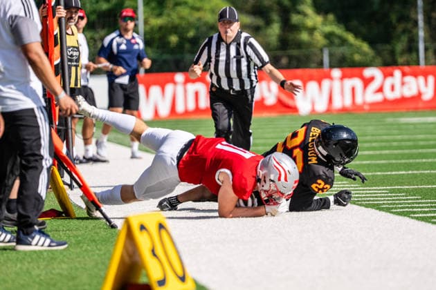 AMERICAN FOOTBALL - IFAF EC, AUT vs BEL SALZBURG,AUSTRIA,04.OCT.26 - AMERICAN FOOTBALL - IFAF European Championship, EM, Europameisterschaft Austria vs Belgium. Image shows Lukas Holub (AUT) and Stef Atidzah (BEL). GEPAxpictures xJulioxArellano