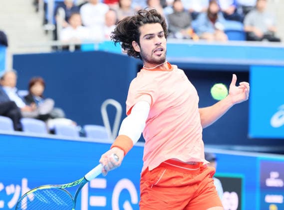 October 4, 2026, Tokyo, Japan - Carlos Alcaraz of Spain returns the ball against Denis Shapovalov of Canada during the quarter-final match of the Japan Open tennis championships at the Ariake Colosseum in Tokyo on Sunday, October 4, 2026. Shapovalov gave up the game in the middle and alcaraz advanced to the semi-final 7-6, 6-1. (photo by Yoshio Tsunoda AFLO) Noxthirdxpartyxsales 0868518499st YoshioxTsunodax