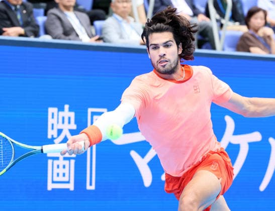 October 4, 2026, Tokyo, Japan - Carlos Alcaraz of Spain returns the ball against Denis Shapovalov of Canada during the quarter-final match of the Japan Open tennis championships at the Ariake Colosseum in Tokyo on Sunday, October 4, 2026. Shapovalov gave up the game in the middle and alcaraz advanced to the semi-final 7-6, 6-1. (photo by Yoshio Tsunoda AFLO) Noxthirdxpartyxsales 0868518513st YoshioxTsunodax
