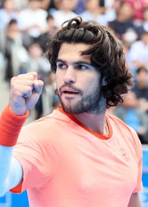 October 4, 2026, Tokyo, Japan - Carlos Alcaraz of Spain clinches his fist as he won a key point against Denis Shapovalov of Canada during the quarter-final match of the Japan Open tennis championships at the Ariake Colosseum in Tokyo on Sunday, October 4, 2026. Shapovalov gave up the game in the middle and alcaraz advanced to the semi-final 7-6, 6-1. (photo by Yoshio Tsunoda AFLO) Noxthirdxpartyxsales 0868518558st YoshioxTsunodax