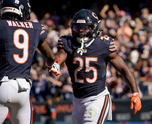 Chicago Bears running back Kyle Monangai (25) celebrates his third quarter touchdown against the New York Jets at Soldier Field in Chicago on Sunday, October 4, 2026. Bears defeated the Jets 23-12. CHI20261004118 MARKxBLACK