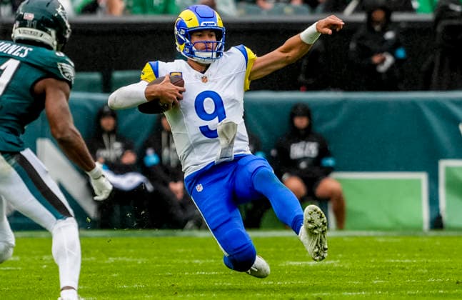 October 4, 2026, Philadelphia, Pa, USA: Oct 4, 2026; Philadelphia, PA, USA; Los Angeles Rams quarterback Matthew Stafford (9) slides after running for yardage during the Rams 24-20 wins against the Eagles at Lincoln Financial Field. Mandatory Credit: -Cal Media Philadelphia USA - ZUMAcs17 20261004_faf_cs17_184 Copyright: xScottxSeriox