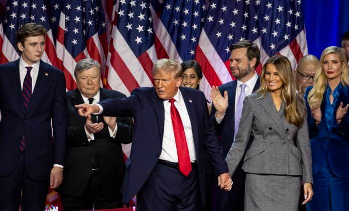 Trump Delivers Victory Speech - West Palm Beach NO FILM, NO VIDEO, NO TV, NO DOCUMENTARY - Republican presidential nominee former President Donald Trump, flanked by his son Baron Trump, JD Vance and his wife Melania Trump, points to the crowd after speaking during his election night party flanked by family and friends at the Palm Beach County Convention Center on Tuesday, November 6, 2024, in West Palm Beach, FL, USA. Photo by Matias J. Ocner Miami Herald TNS ABACAPRESS.COM West Palm Beach FL United States Copyright: xMiamixHerald TNS ABACAx