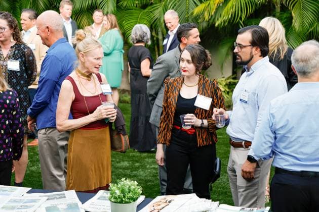 October 23, 2025, St. Petersburg, Florida, USA: Tampa Bay Times staffers and guests mingle with each other during the annual Cocktails and News fundraiser event on Thursday, Oct. 23, 2025, in St. Petersburg. St. Petersburg USA - ZUMAs70_ 20251023_zan_s70_081 Copyright: xJeffereexWoox