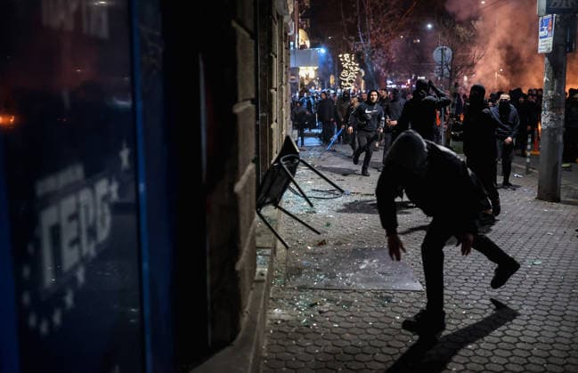 2026 State Budget Bill protest in Sofia SOFIA, BULGARIA-DECEMBER 01: Protesters clash with police during a second demonstration against the 2026 State Budget Bill in Sofia, Bulgaria, on December 01, 2025. Hundreds gathered for a second protest to halt the budget vote, which includes increased public-sector wage costs alongside higher insurance premiums for private-sector employees. Among the most criticized proposals are raising the external debt to 37.6 billion, increasing pension contributions by 2%, lifting the maximum social security income to 4,600 leva (2,352), raising the minimum social security income to 1,213 leva (620), and doubling the dividend tax rate from 5% to 10%. Borislav Troshev Anadolu Sofia Bulgaria. Editorial use only Copyright: x2025xAnadoluxBorislavxTroshevx