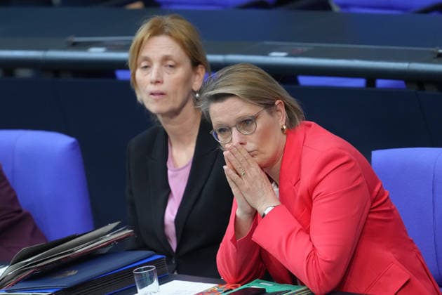 German Bundestag, 67th plenary session Karin Prien, Federal Minister of Education, Family Affairs, Senior Citizens, Women and Youth together with Dr. Stefanie Hubig, Federal Minister of Justice and Consumer Protection listen to the debate on violence against women and girls on the government bench at the 67th session of the German Bundestag in Berlin, 25