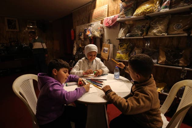 May 5, 2026, Beirut, Beirut, Lebanon: Displaced children draw during a workshop and an exhibition at a local theatre under the slogan Our Land, Our Identity , showcasing childrenâ€⠢s artwork about memory, belonging and hope. Despite an announced ceasefire between Israel and pro-Iranian Hezbollah in place since 17 April, the displacement and humanitarian crisis in Lebanon is far from over. This is a deeply fragile moment, marked by ongoing Israeli airstrikes, shelling, demolitions, evacuation orders, bans on return to certain areas and movement restrictions that continue to drive repeated displacement and rapidly growing humanitarian needs. Beirut Lebanon - ZUMAn313 20260505_zip_n313_009 Copyright: xMarwanxNaamanix