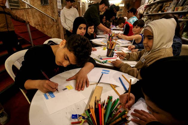 May 5, 2026, Beirut, Beirut, Lebanon: Displaced children draw during a workshop and an exhibition at a local theatre under the slogan Our Land, Our Identity , showcasing childrenâ€⠢s artwork about memory, belonging and hope. Despite an announced ceasefire between Israel and pro-Iranian Hezbollah in place since 17 April, the displacement and humanitarian crisis in Lebanon is far from over. This is a deeply fragile moment, marked by ongoing Israeli airstrikes, shelling, demolitions, evacuation orders, bans on return to certain areas and movement restrictions that continue to drive repeated displacement and rapidly growing humanitarian needs. Beirut Lebanon - ZUMAn313 20260505_zip_n313_008 Copyright: xMarwanxNaamanix