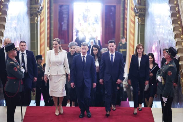 (260509) -- BUDAPEST, May 9, 2026 -- Peter Magyar (2nd L, front), leader of Hungary s Tisza Party, and Agnes Forsthoffer (L, front), vice president of the Tisza Party, attend the inaugural session of Hungary s new parliament in Budapest, Hungary, May 9, 2026. Hungary s new parliament convened on Saturday for its inaugural session, electing Agnes Forsthoffer, vice president of the Tisza Party, as speaker of the National Assembly. In the parliamentary elections, the Tisza Party, led by Peter Magyar, defeated the ruling Fidesz-KDNP coalition led by Viktor Orban, winning 141 of the 199 seats and securing a two-thirds majority in the new parliament. (Photo by Xinhua) HUNGARY-BUDAPEST-NEW PARLIAMENT-INAUGURAL SESSION DavidxBalog