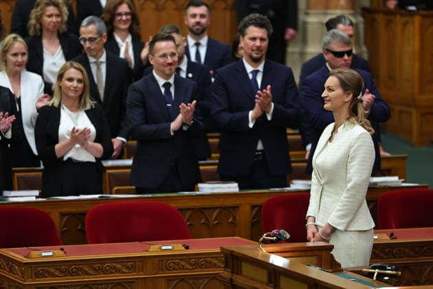(260509) -- BUDAPEST, May 9, 2026 -- Hungarian parliament members congratulate Agnes Forsthoffer on being elected as speaker of the National Assembly in Budapest, Hungary, May 9, 2026. Hungary s new parliament convened on Saturday for its inaugural session, electing Agnes Forsthoffer, vice president of the Tisza Party, as speaker of the National Assembly. In the parliamentary elections, the Tisza Party, led by Peter Magyar, defeated the ruling Fidesz-KDNP coalition led by Viktor Orban, winning 141 of the 199 seats and securing a two-thirds majority in the new parliament. (Photo by Xinhua) HUNGARY-BUDAPEST-NEW PARLIAMENT-INAUGURAL SESSION DavidxBalog