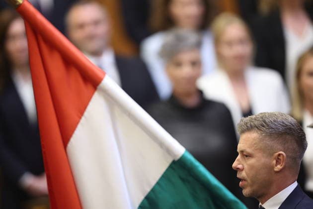 (260509) -- BUDAPEST, May 9, 2026 -- Peter Magyar is sworn in as prime minister of Hungary at the House of Parliament in Budapest, Hungary, on May 9, 2026. Peter Magyar, leader of Hungary s Tisza Party, was elected prime minister of Hungary in a vote at the inaugural session of the new parliament on Saturday. A total of 195 out of the 199 members of parliament cast votes, with 140 in favor, 54 against and 1 abstentions. Magyar secured the required majority to be elected prime minister, marking the start of his four-year term. In the parliamentary elections held on April 12, the Tisza Party, led by Magyar, defeated the ruling Fidesz-KDNP coalition led by Viktor Orban, winning 141 of the 199 seats and securing a two-thirds majority in