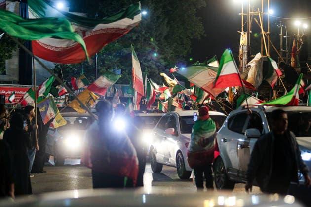 May 12, 2026, Iran, Iran: Pro-government supporters wave national flags during a state-organized rally, amid a ceasefire in the conflict involving Iran, the United States, and Israel. The United States and Israel launched strikes against Iran on February 28, killing Iranâ€⠢s supreme leader and top military leaders, prompting Iranian authorities to retaliate with strikes on Israel and across the Gulf, while U.S. President Donald Trump recently described the ceasefire agreement with Iran as being in a â€oevery weak†state and the spokesman for the Iranian parliamentâ€⠢s national security commission warned the United States on May 10 against any attacks on vessels in Gulf waters, saying Iranâ€⠢s restraint was over. Ira - ZUMAi98_ 20260512_zih_i98_026 Copyright: xIranianxSupremexLeader SxOfficex