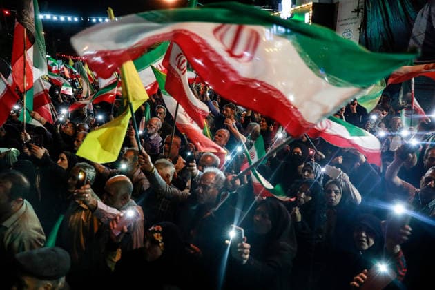 May 12, 2026, Iran, Iran: Pro-government supporters wave national flags during a state-organized rally, amid a ceasefire in the conflict involving Iran, the United States, and Israel. The United States and Israel launched strikes against Iran on February 28, killing Iranâ€⠢s supreme leader and top military leaders, prompting Iranian authorities to retaliate with strikes on Israel and across the Gulf, while U.S. President Donald Trump recently described the ceasefire agreement with Iran as being in a â€oevery weak†state and the spokesman for the Iranian parliamentâ€⠢s national security commission warned the United States on May 10 against any attacks on vessels in Gulf waters, saying Iranâ€⠢s restraint was over. Ira - ZUMAi98_ 20260512_zih_i98_028 Copyright: xIranianxSupremexLeader SxOfficex