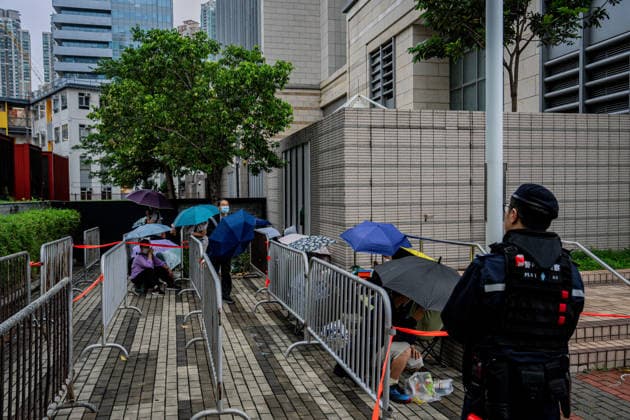 Closing arguments of Tiananmen Square activists trial starts HONG KONG, CHINA - MAY 18: Police officers stand guard outside the West Kowloon Magistrates Court in Hong Kong, China, on May 18, 2026. Closing arguments in the national security case involving the Hong Kong Alliance in Support of Patriotic Democratic Movements of China are scheduled to last three days. Lee Cheuk-yan, 69, and Chow Hang-tung, 41, who organised candlelight vigils to mark Beijing s deadly crackdown on demonstrators in Tiananmen Square in 1989, are standing trial for incitement to subversion , which carries a maximum penalty of 10 years in jail. Harry Leung Anadolu Hong Kong China. Editorial use only. Please get in touch for any other usage. Copyright: x2026xAnadoluxHarryxLeungx