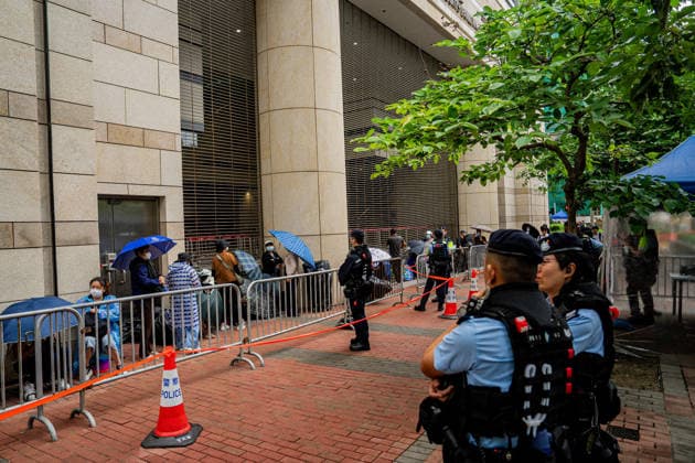 Closing arguments of Tiananmen Square activists trial starts HONG KONG, CHINA - MAY 18: Police officers stand guard outside the West Kowloon Magistrates Court in Hong Kong, China, on May 18, 2026. Closing arguments in the national security case involving the Hong Kong Alliance in Support of Patriotic Democratic Movements of China are scheduled to last three days. Lee Cheuk-yan, 69, and Chow Hang-tung, 41, who organised candlelight vigils to mark Beijing s deadly crackdown on demonstrators in Tiananmen Square in 1989, are standing trial for incitement to subversion , which carries a maximum penalty of 10 years in jail. Harry Leung Anadolu Hong Kong China. Editorial use only. Please get in touch for any other usage. Copyright: x2026xAnadoluxHarryxLeungx
