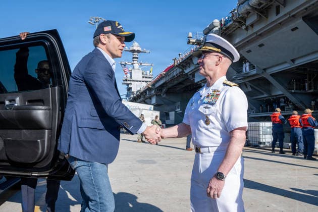 May 18, 2026, Norfolk, Va, United States of America: U.S. Defense Secretary Pete Hegseth, left, is welcomed by Chief of Naval Operations Adm. Daryl Caudle, right, pier side for homecoming celebrations for the Ford-class super carrier, USS Gerald R. Ford at Naval Station Norfolk, May 16, 2026, in Norfolk, Virginia. The ship returned following a historic 11-month deployment sailing over 57,713 nautical miles. Norfolk United States of America - ZUMAp138 20260518_zaa_p138_042 Copyright: xMc1xJohnxBellino UsxNavyx