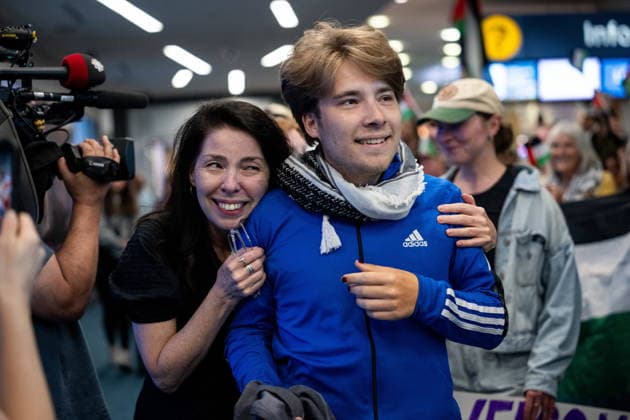 May 24, 2026, Vancouver, Bc, CANADA: Sebastian Tow, right, member of the Gaza flotilla, reunites with his mother Anita Wittenberg as he arrives at the Vancouver International Airport in Richmond B.C., on Sunday, May 24, 2026. Vancouver CANADA - ZUMAc35_ 20260524_zaf_c35_147 Copyright: xEthanxCairnsx