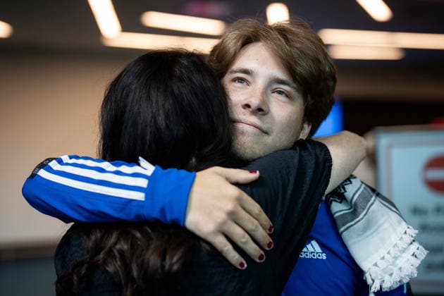 May 24, 2026, Vancouver, Bc, CANADA: Sebastian Tow, right, member of the Gaza flotilla, reunites with his mother Anita Wittenberg as he arrives at the Vancouver International Airport in Richmond B.C., on Sunday, May 24, 2026. Vancouver CANADA - ZUMAc35_ 20260524_zaf_c35_150 Copyright: xEthanxCairnsx