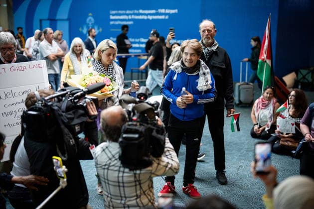May 24, 2026, Vancouver, Bc, CANADA: Mary Grace Mathisen, left to right, Sebastian Tow, and Michael France, members of the Gaza bound flotilla which was detained by Israel, arrive at the Vancouver International Airport in Richmond B.C., on Sunday, May 24, 2026. Vancouver CANADA - ZUMAc35_ 20260524_zaf_c35_163 Copyright: xEthanxCairnsx